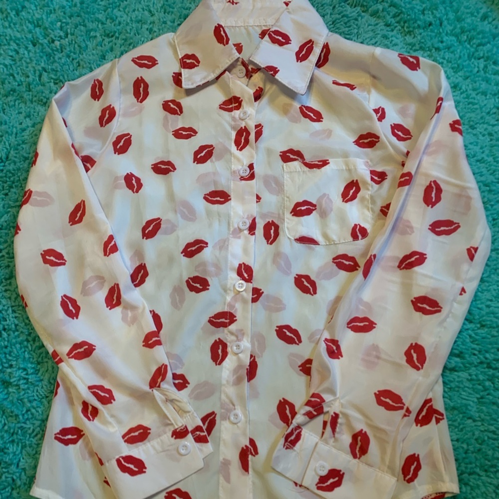 Women’s Red Lipstick Kiss on a White Blouse Shirt